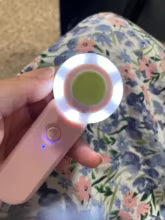Pink trimmer in a hand